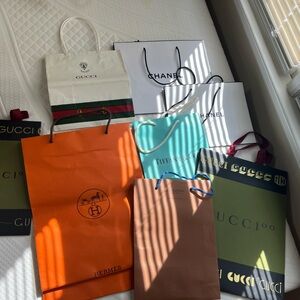 Lot of 8 Designer shopping paper bags. Tiffany, Chanel, Louis Vuitton, Gucci